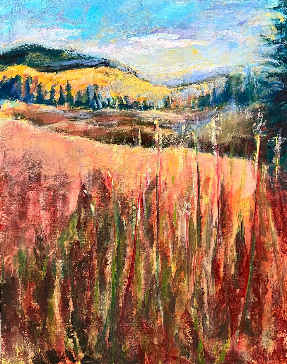 Autumn landscape of the Rocky Mountains with a stand of golden Aspens.
