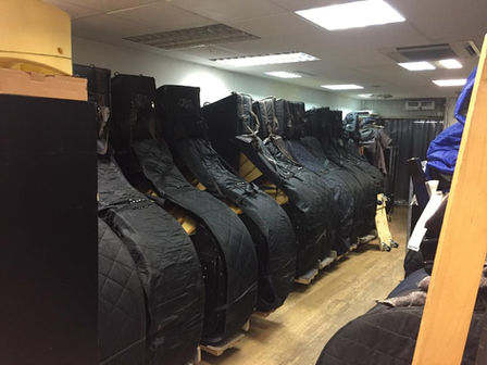 Grand Pianos Are Stacked and Stored in our Storage