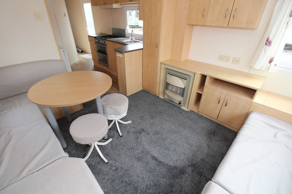 Miniaturbild: Sala de estar e zona de jantar e lareira