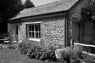 about me website desk studio and flower 2 BW GOOD.jpg