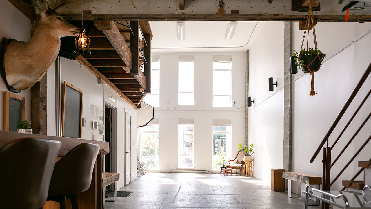 Cinderbloc studio main studio with 18 foot ceilings, perfect for product and portrait photography, best natural light studio in victoria bc, live music venue