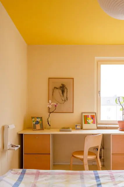 Bright yellow ceiling in office