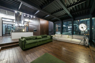 modern loft apartment with floor to ceiling windows