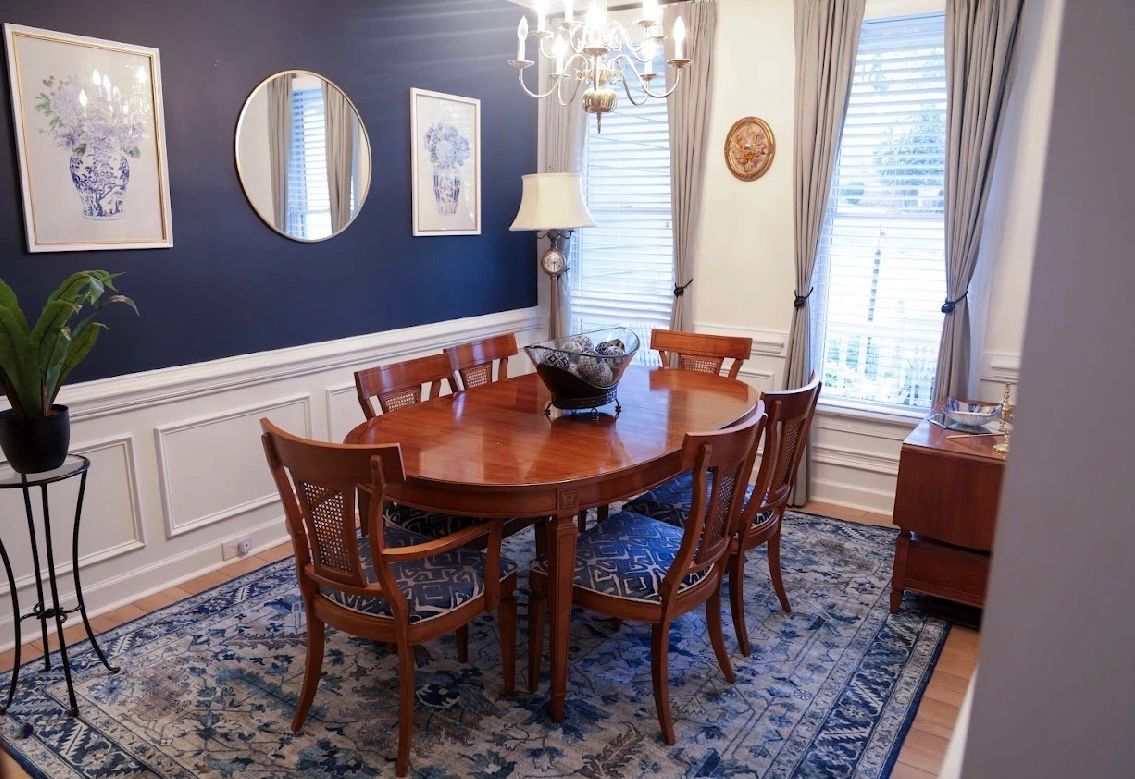 Elegant dining room with wooden table and chairs