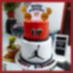 2 tier cake with 1 dozen cupcakes