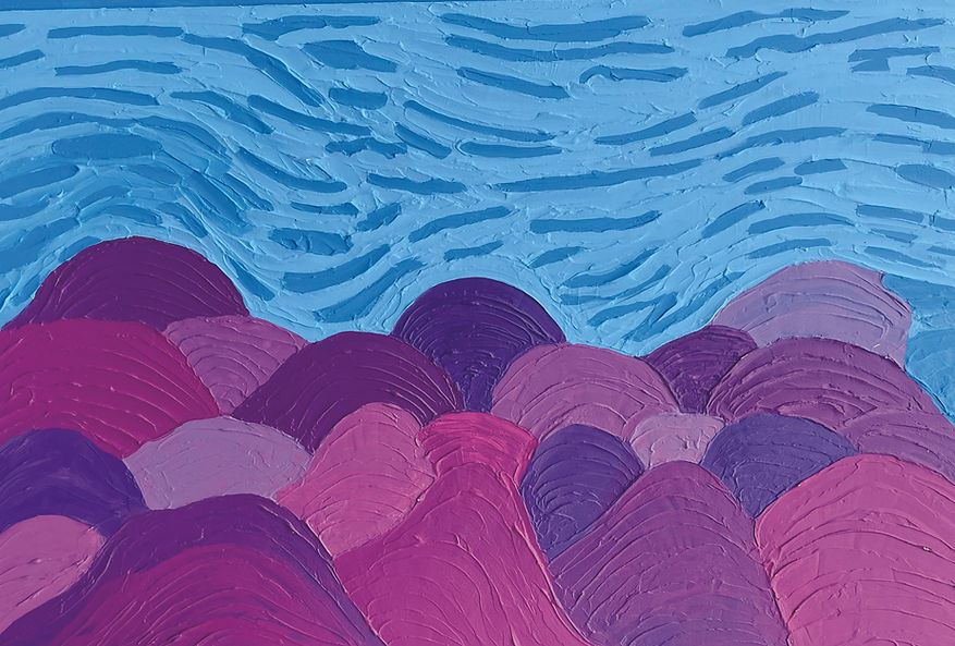 A wild blue sky overtop cascading purple hills