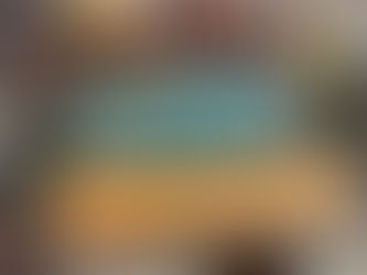 Wood crate full of blue Ball jars