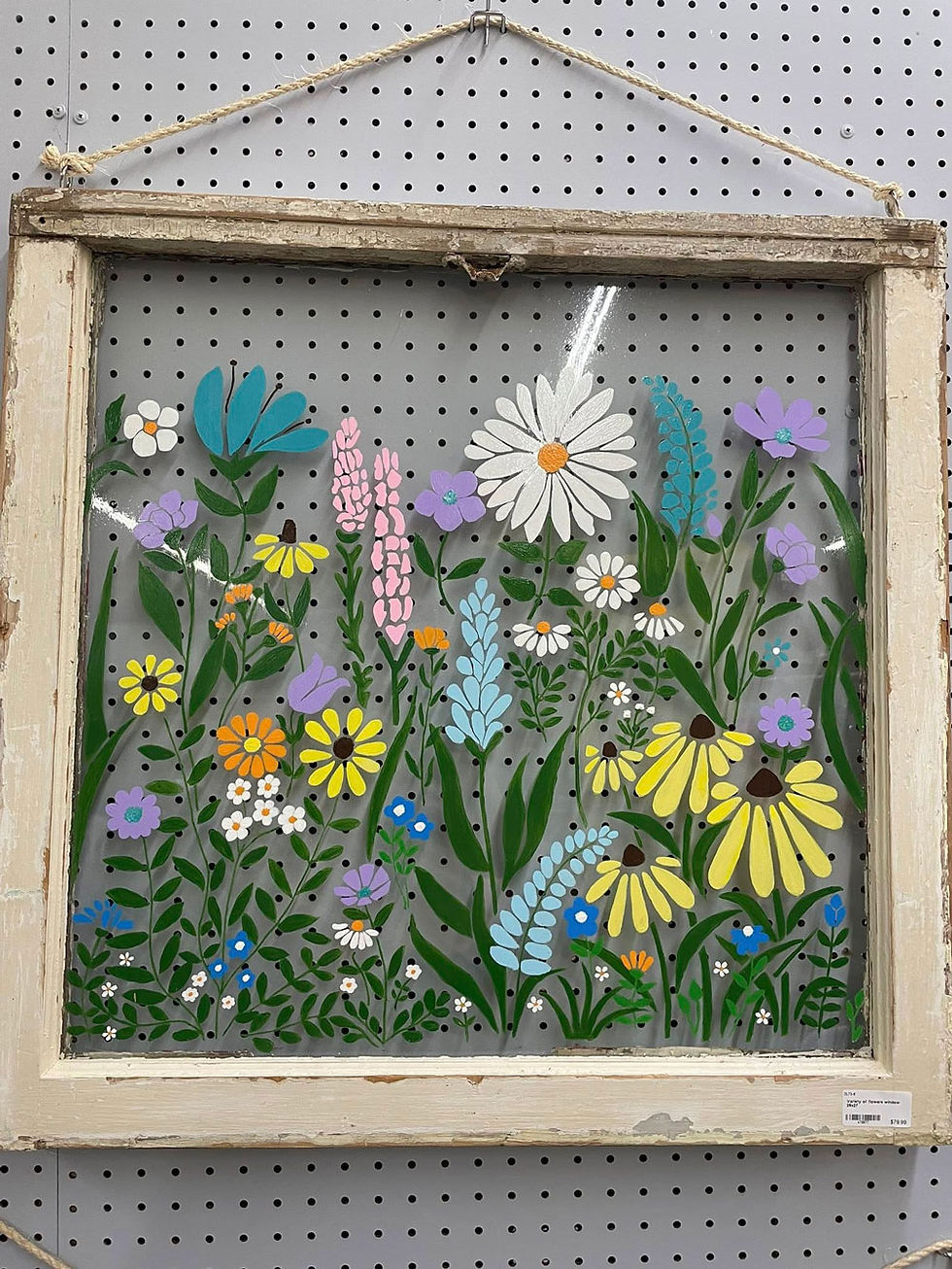Vintage window with painted flowers