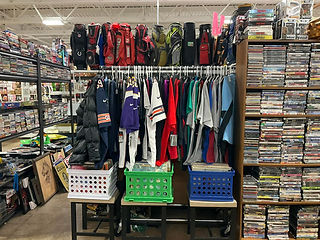 Vintage clothing and cassettes in antique mall