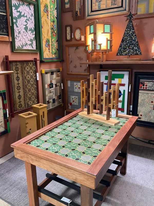Eclectic collection of art in antique mall booth