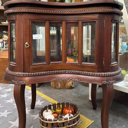 Antique side table with glass doors
