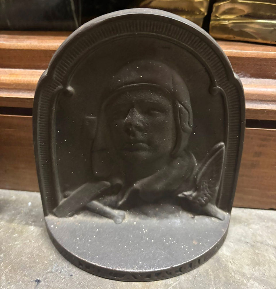 Pilot cast iron doorstop