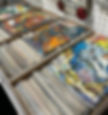 Boxes of comic books in antique mall booth