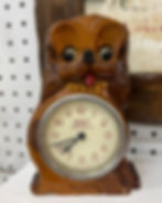 Tezuka Clock Co. carved dog mantel clock