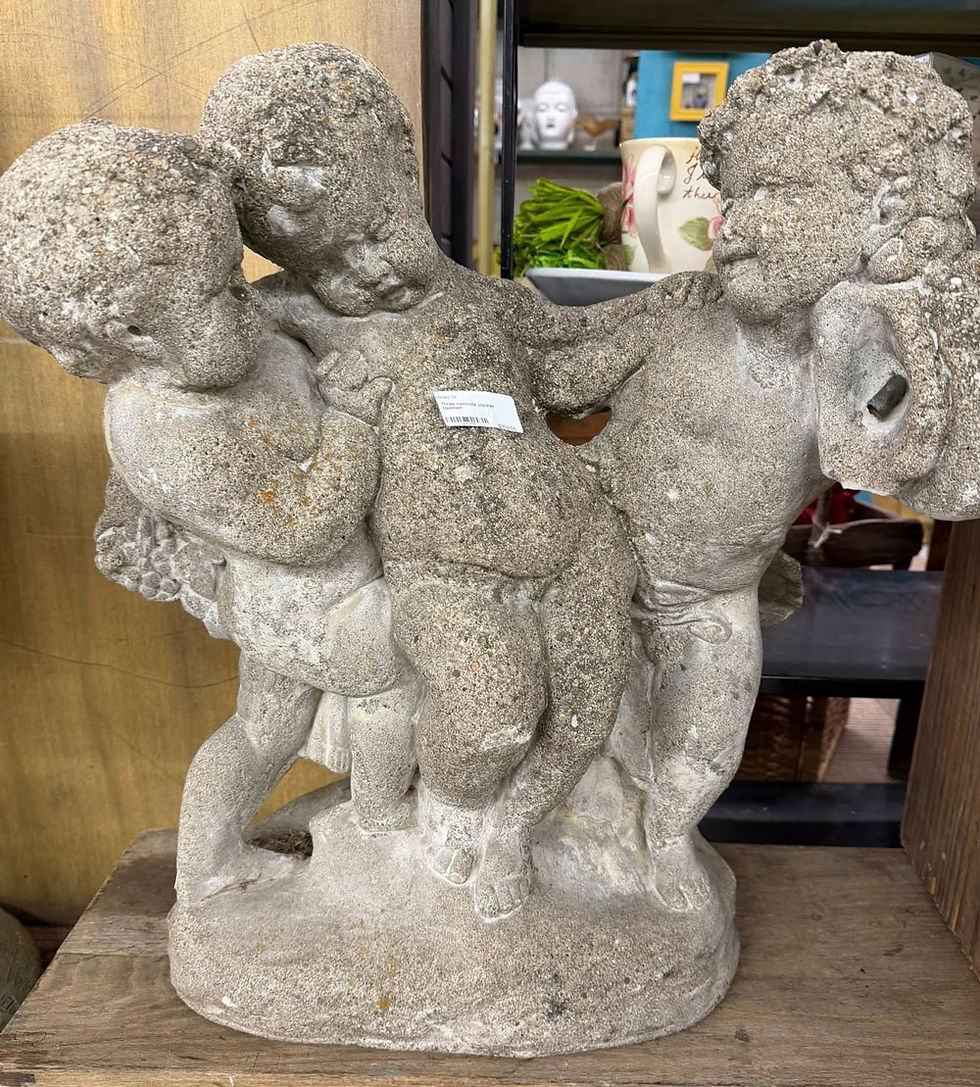 Stone cherub garden statue