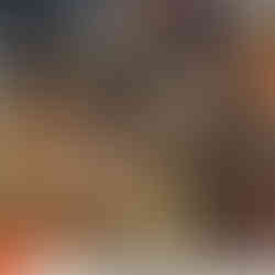 Antique mall vendor booth featuring vintage art and home décor