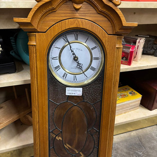 Antique wall clock with stained class detail