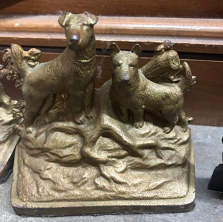 vintage cast iron door stop with dogs