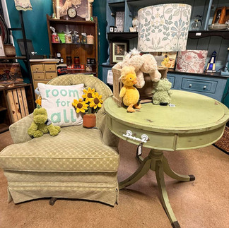 Fabric accent chair and green painted table