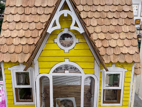 Vintage handmade yellow dollhouse