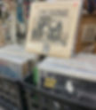 Crates of vinyl records with Blind Faith album displayed