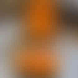 Antique orange upholstered chair