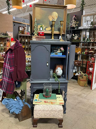 Vendor mall booth with vintage furniture