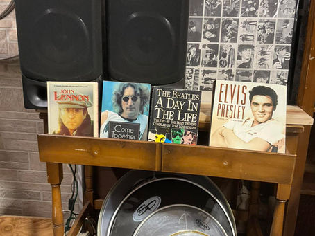 Vintage music memorabilia, speakers, and drum heads
