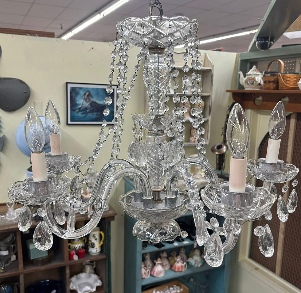 Crystal chandelier inside antique store booth