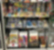 Antique mall display case of comic books and memorabilia