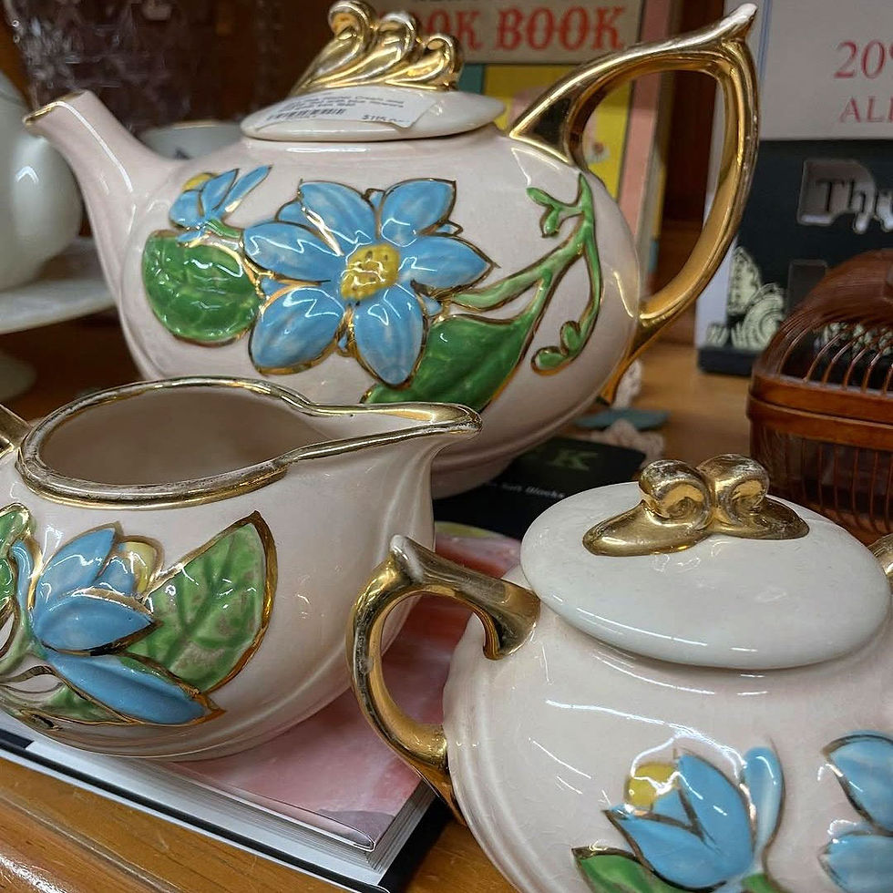 Vintage tea pot with sugar and creamer set