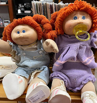 Two vintage Cabbage Patch dolls in antique mall
