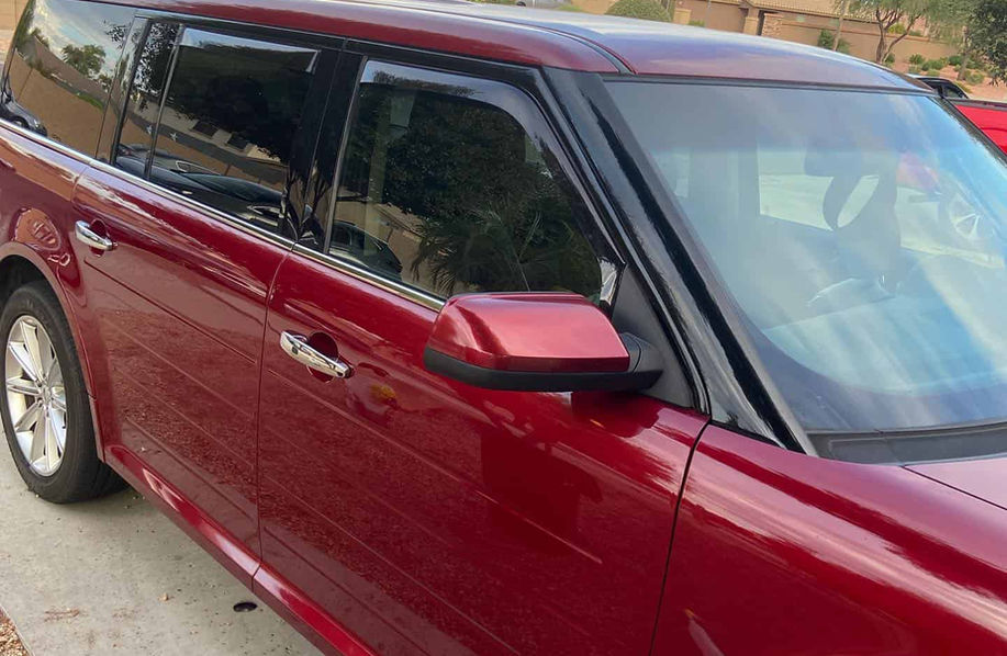 Red flex detailed in the drive way - Car detailing in Surprise AZ