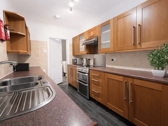 Fully equipped kitchen in 3 bedroom student house in Stoke-on-Trent, ideal for shared student living.