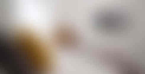 double student bedroom with large wall-mounted TV