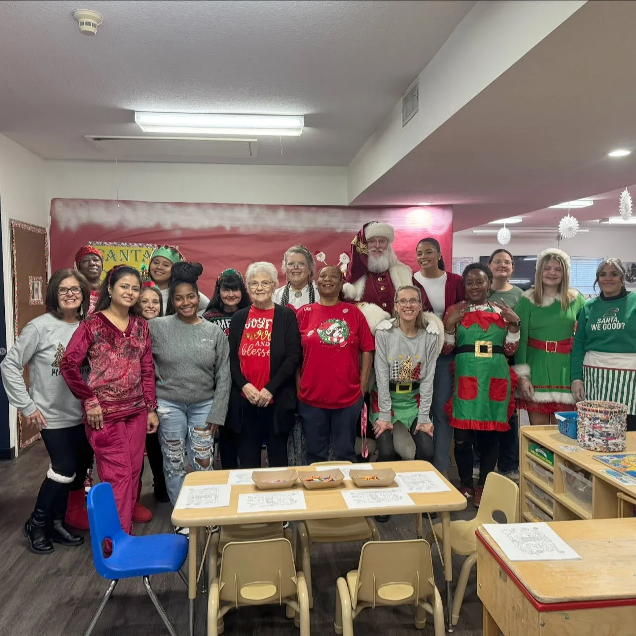 The school’s Breakfast with Santa event team together with Santa in December 2025