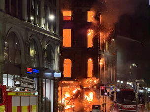 SFRS has handed over control of the site of a major Glasgow fire to Glasgow City Council