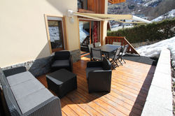 Terrasse avec store