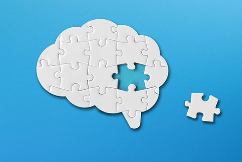 Brain shaped white jigsaw puzzle on blue background, a missing piece of the brain puzzle,