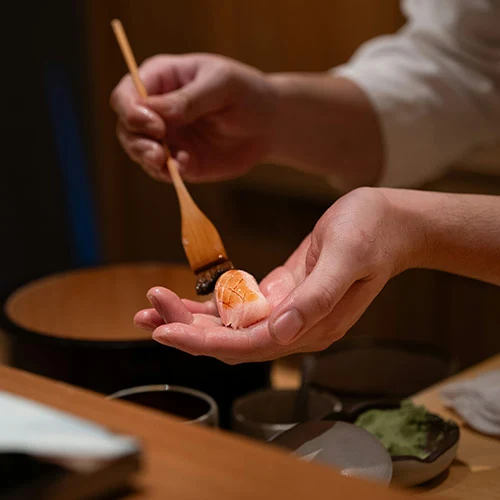 private chef Niseko preparing dinner in chalet kitchen
