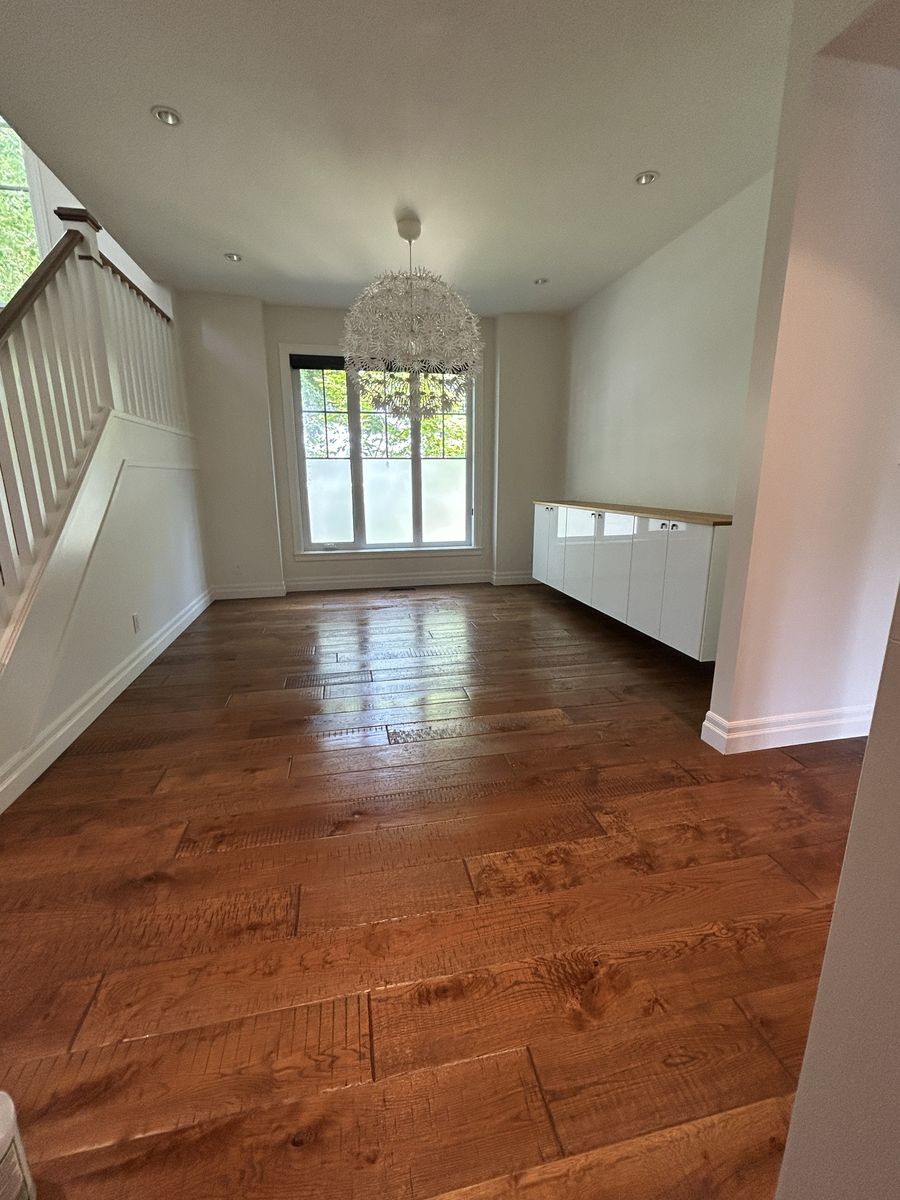 A bright room with clean wood floors