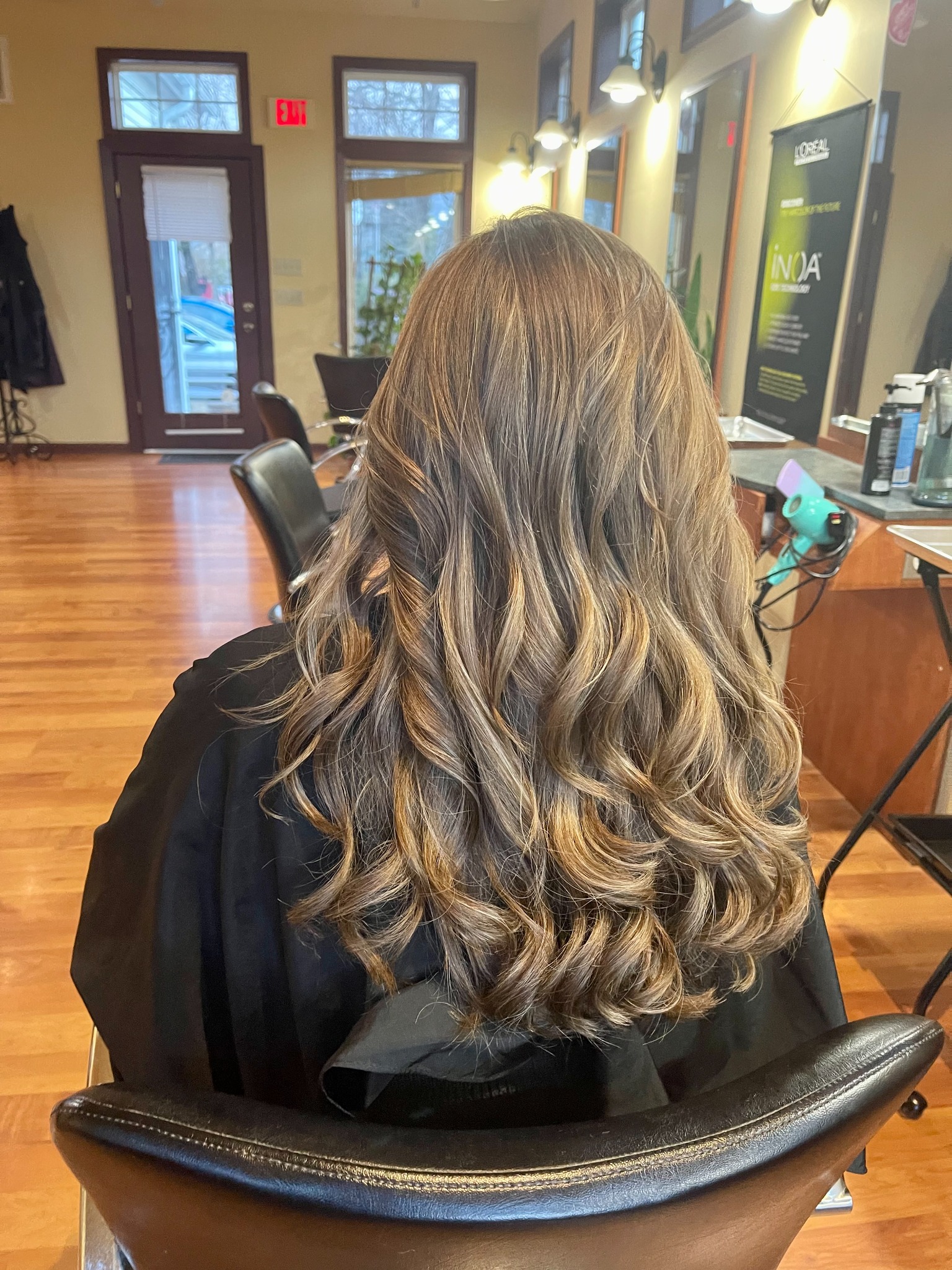 Warm, flowing curls by Miracelly Salon & Spa