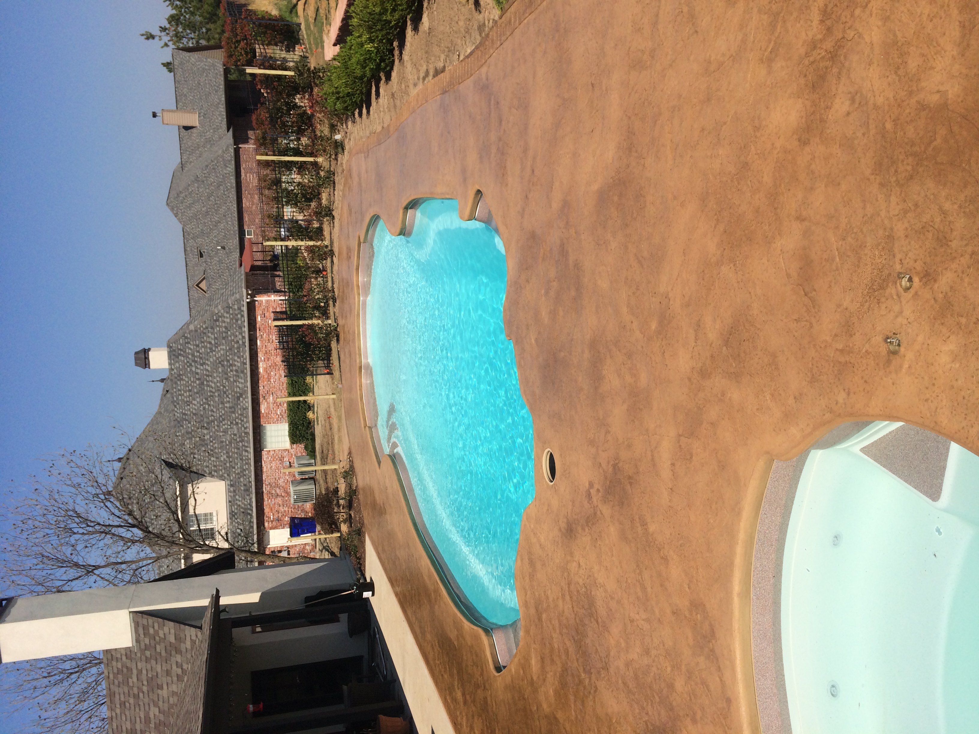 Stamped & stained pool deck in Tulsa