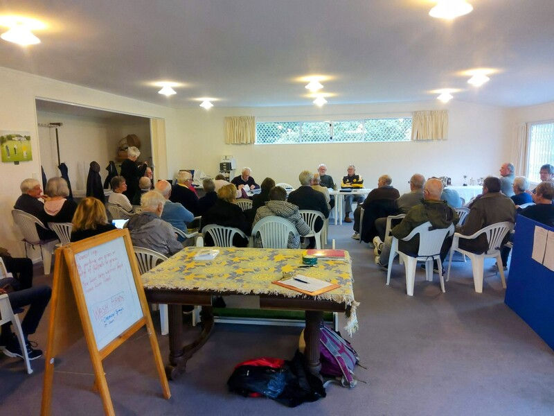Event in clubhouse with people at tables