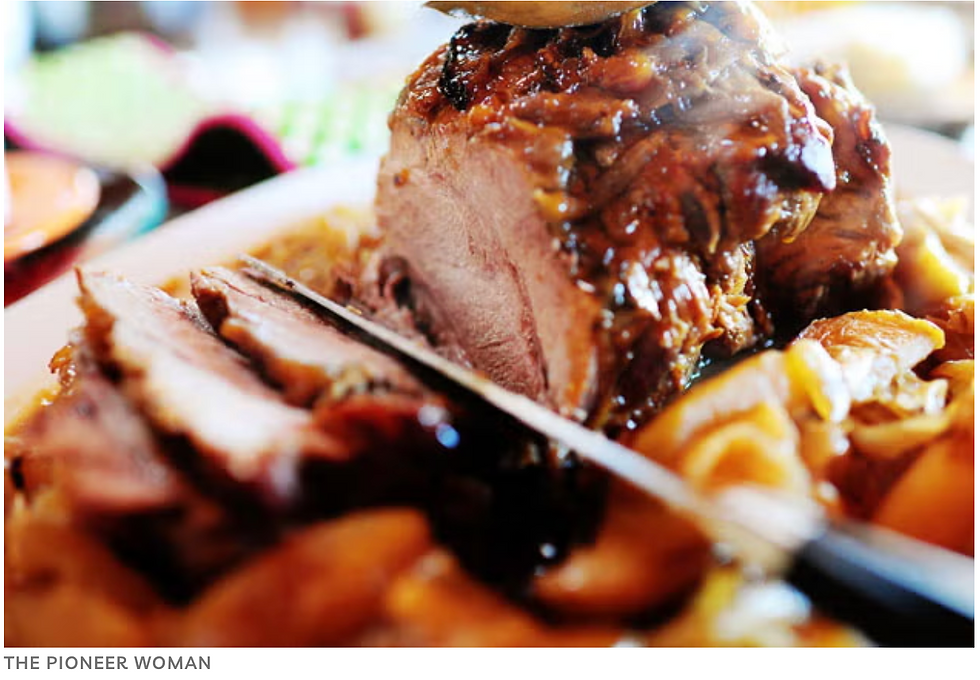 sliced roast pork with onion and apple