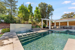 Waterfall and outdoor kitchen