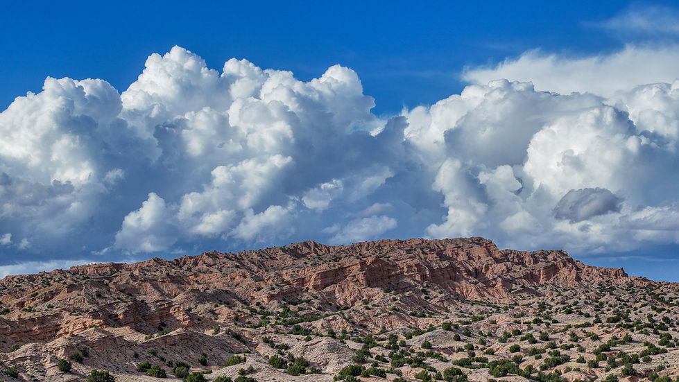 mountains landscape with cloud formation on top