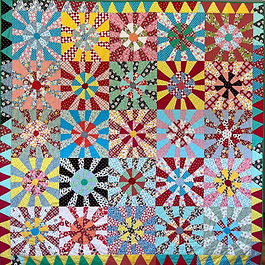 Sunburst scrap quilt by Sujata Shah