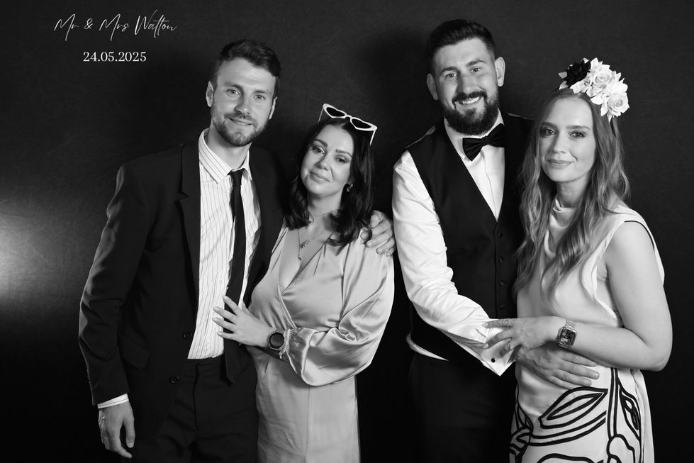 Four friends pose for black and white wedding photo, Mr & Mrs Walker 24.06.2023