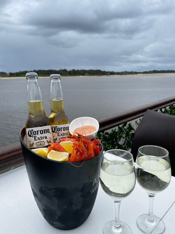 Order bucket of prawns and beer on Port AdVenture Cruises Port Macquarie 
